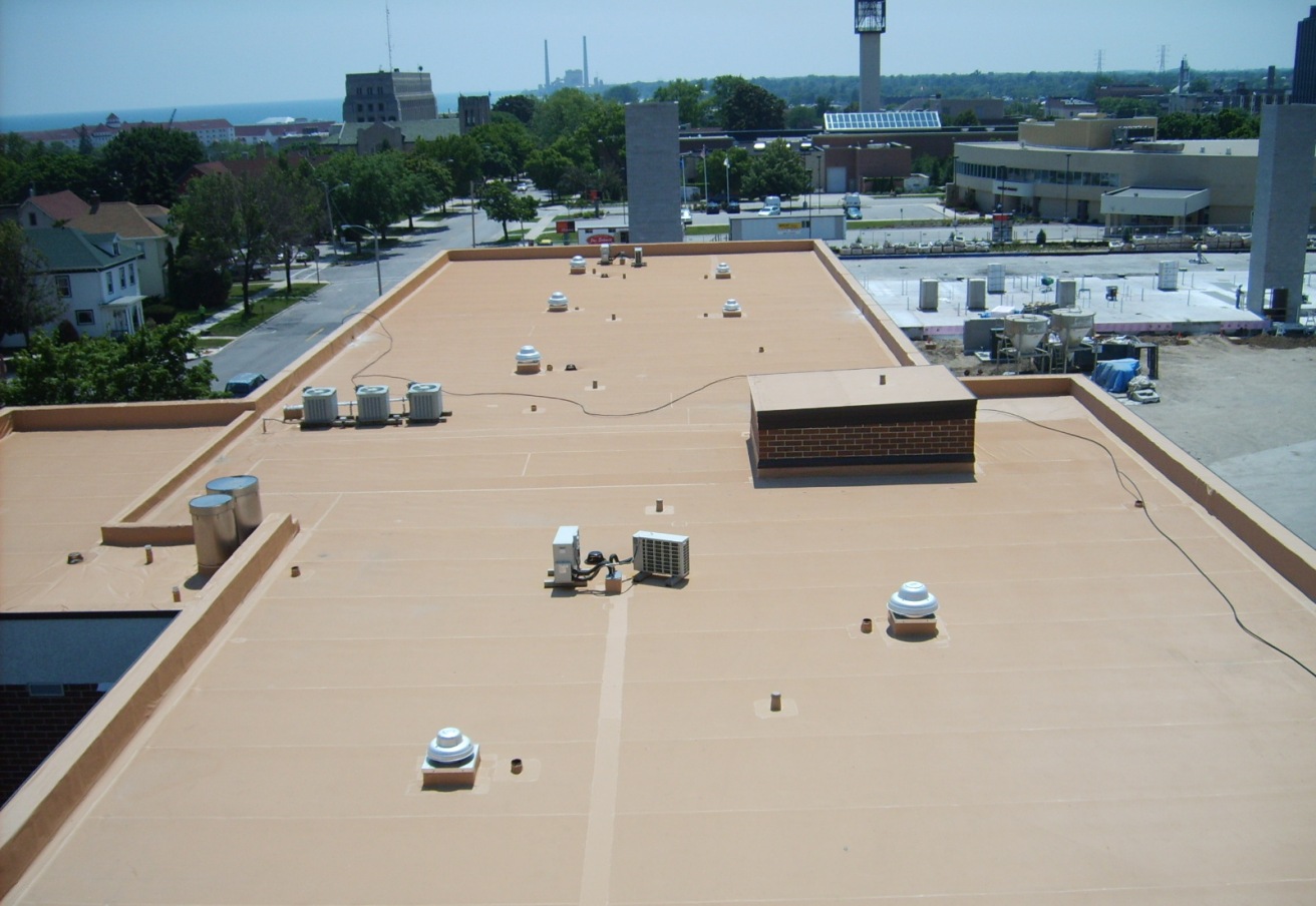 White reflective commercial roof after installation