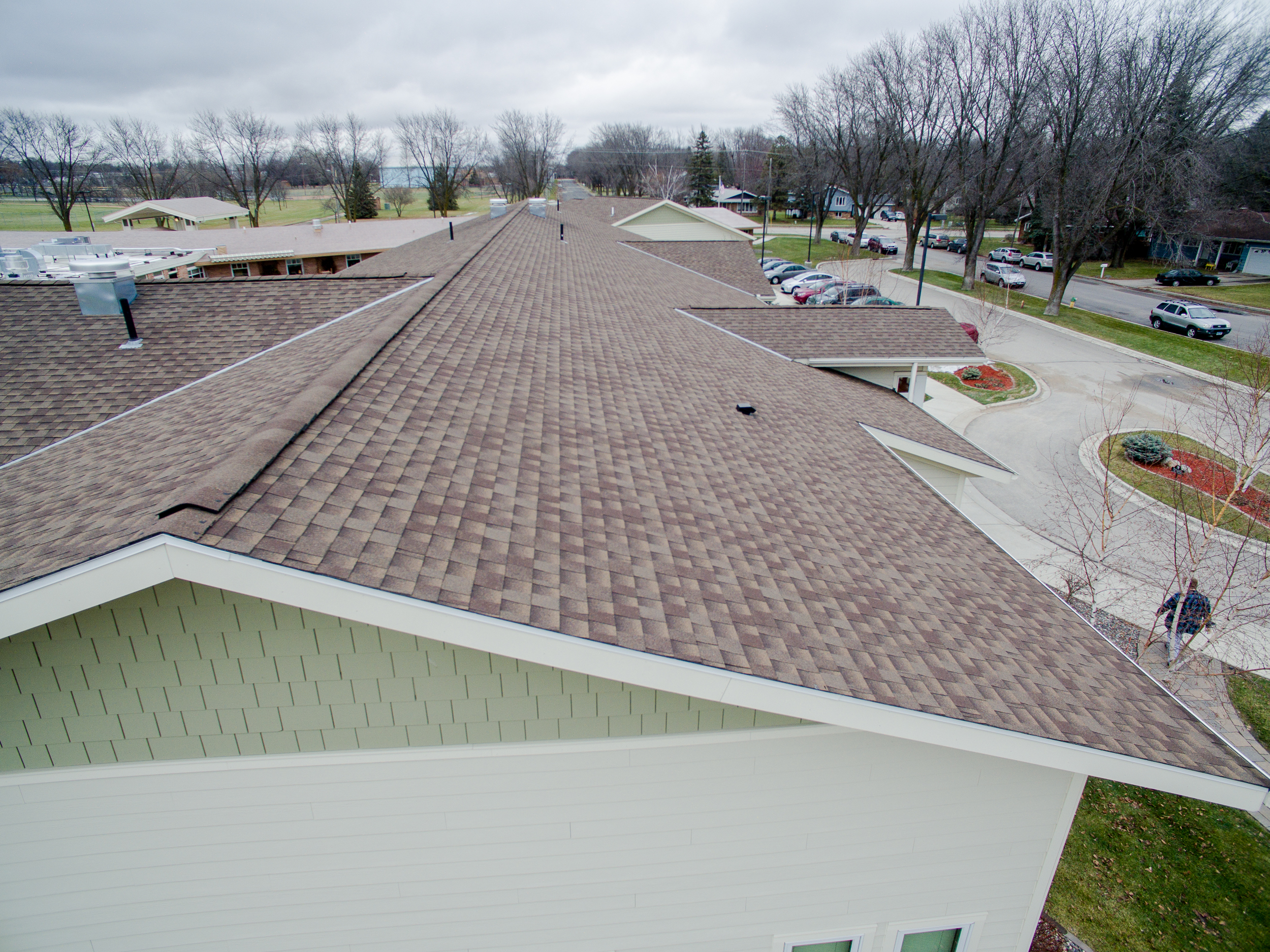 Residential shingle and ply roof at Rice Care Center