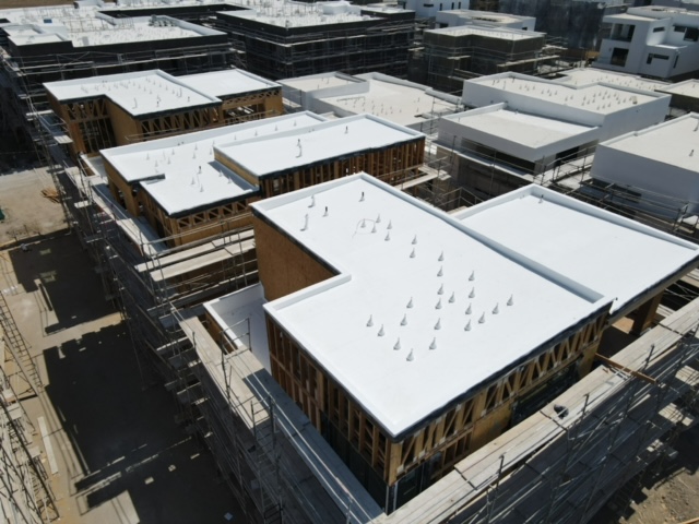 Completed commercial roof with HVAC units